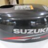 Suzuki outboard motor hood off a 4 stroke 6 HP